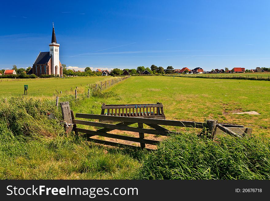 Church with grassland on a sunny day in spring
