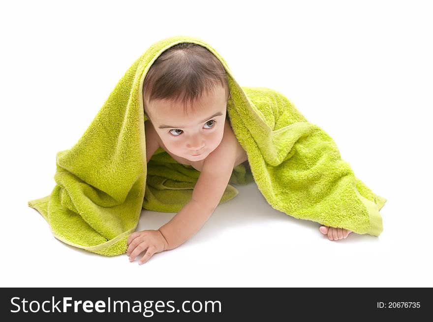 Beautiful baby with a towel over your head. Beautiful baby with a towel over your head