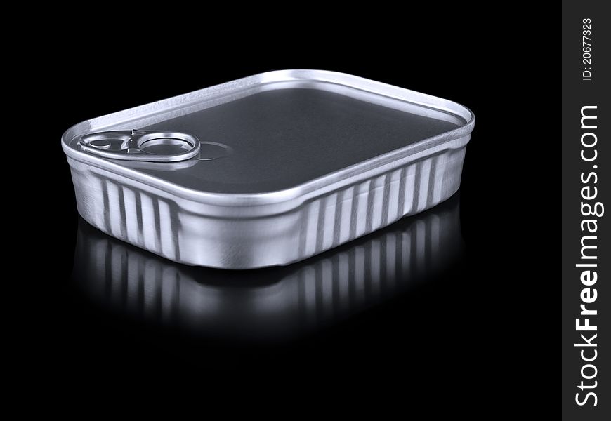 A single tin can container isolated on black. A single tin can container isolated on black.