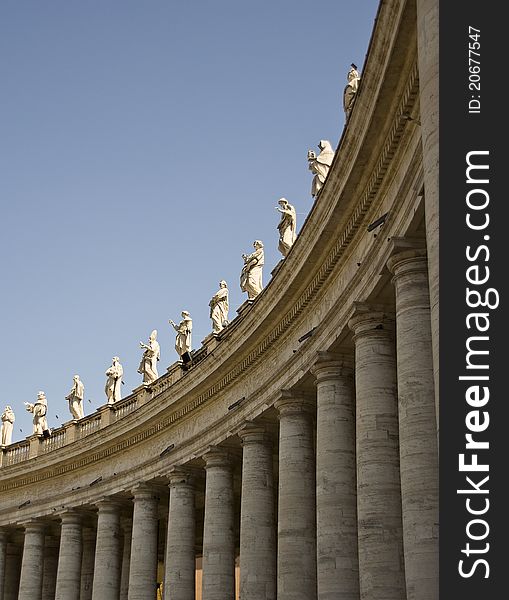 A view of the many statutes standing high above the colonnade in St Peter's Square. A view of the many statutes standing high above the colonnade in St Peter's Square.