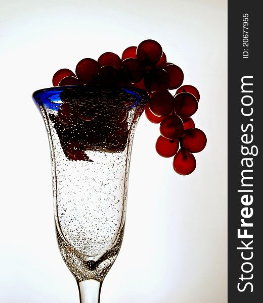 Abstract wine glassware background design with grapes. Abstract wine glassware background design with grapes.