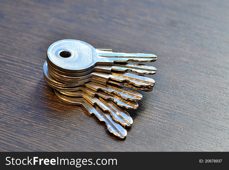 A bunch of keys stacked together. A bunch of keys stacked together