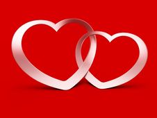 Two Jointed Hearts On Red Stock Photo Two Jointed Hearts On Red Stock Photo