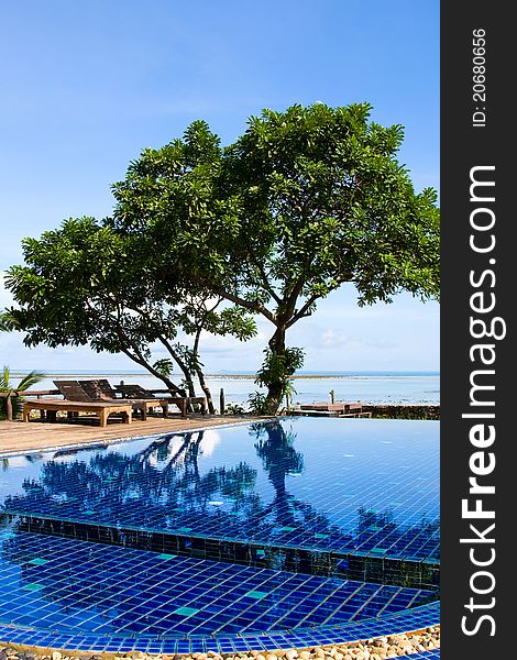 Swimming pool in luxury resort near the sea