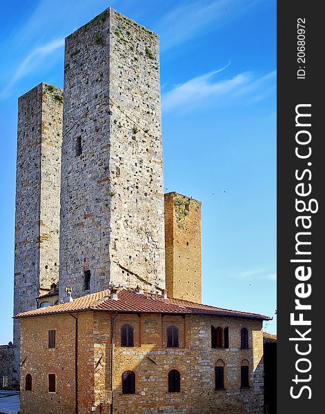 On the photo: Towers of noble citizens. San Gimignano, Italy