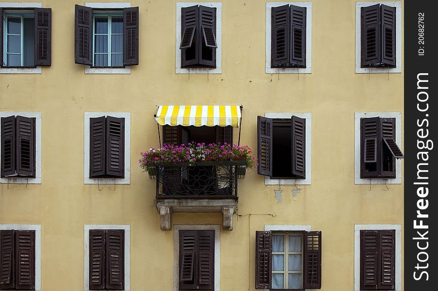 Classic italian windows with flowers. Classic italian windows with flowers