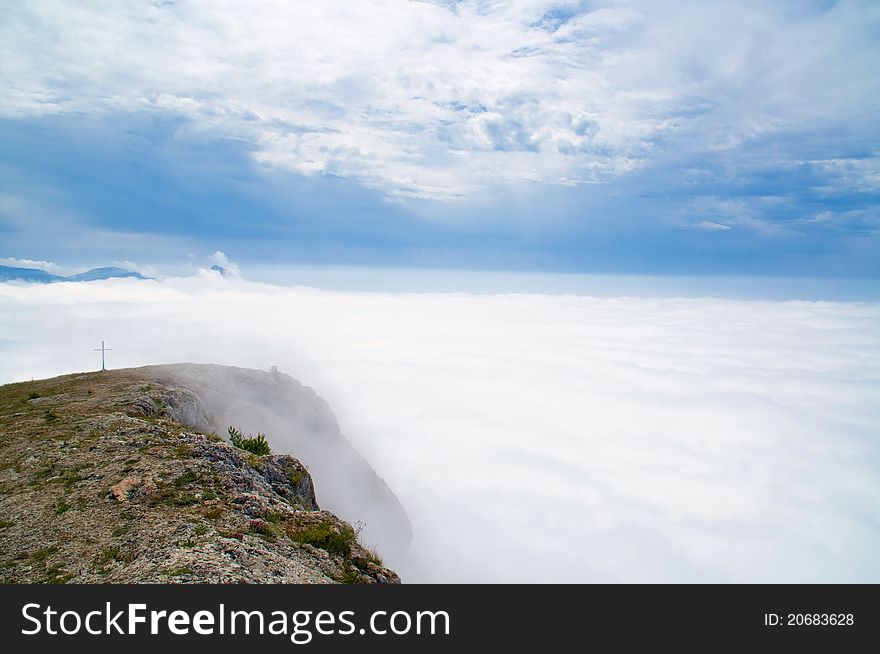 Mountain peaks towering above the clouds
