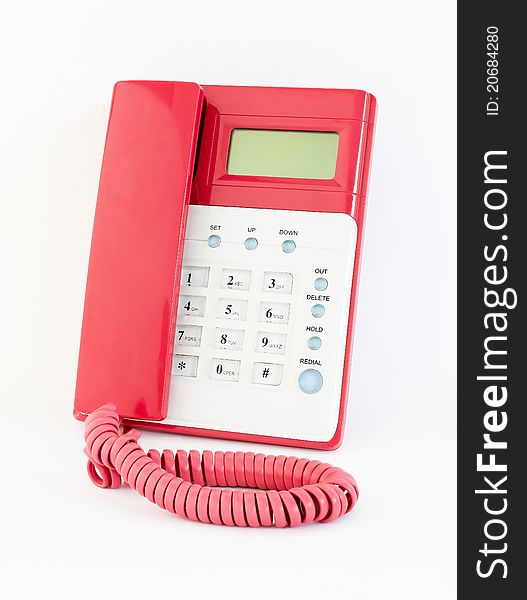 The pink telephone on a white background