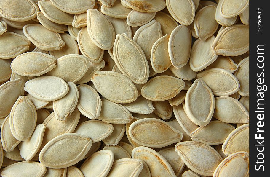 Dried pumpkin seeds close up image