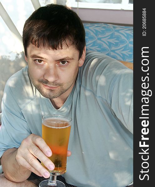 Portrait Of Handsome Man Drinking