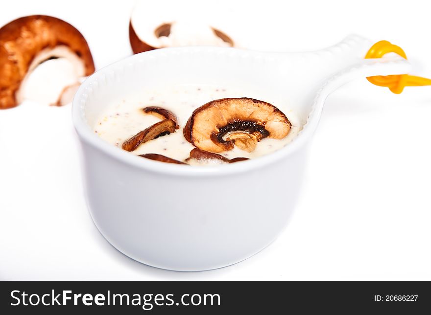 Mushrooms sauce, cream, dressing, dip in a white gravy boat. Mushrooms sauce, cream, dressing, dip in a white gravy boat