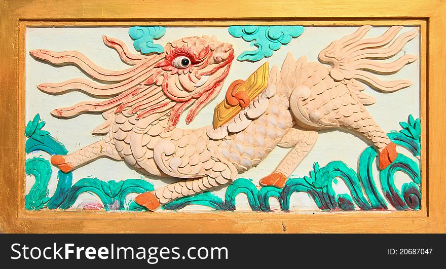 Chinese style dragon decorating on the temple wall