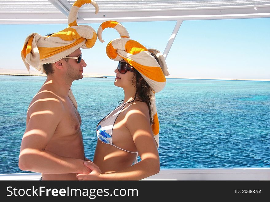 Young happy couple on a boat. Young happy couple on a boat