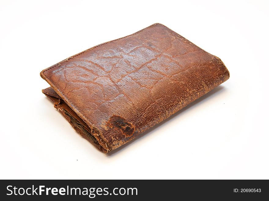 Old destryed wallet made of leather on white background. Old destryed wallet made of leather on white background