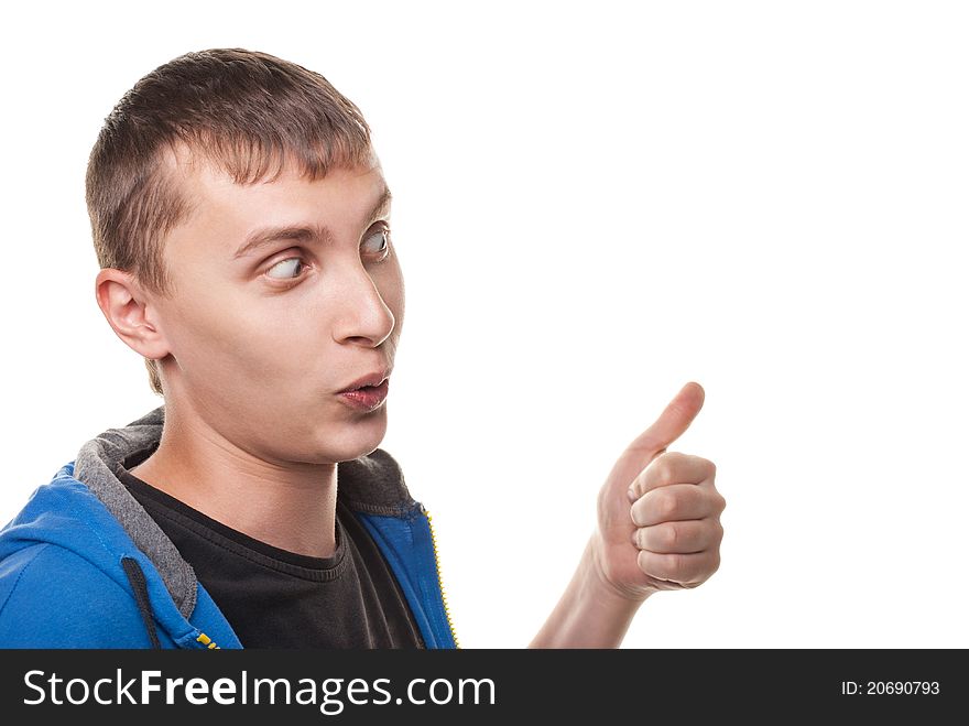 Portrait of a handsome young man, thumbs up over white background