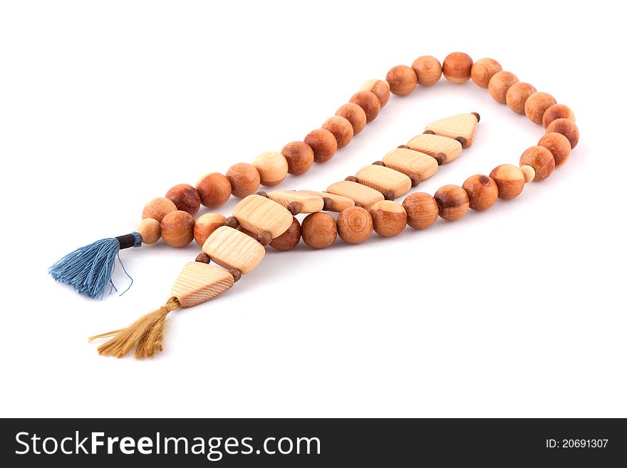 Wooden rosary isolated in white