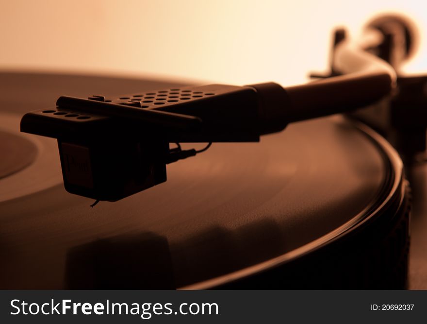 Old turntable with vinyl record. Old turntable with vinyl record