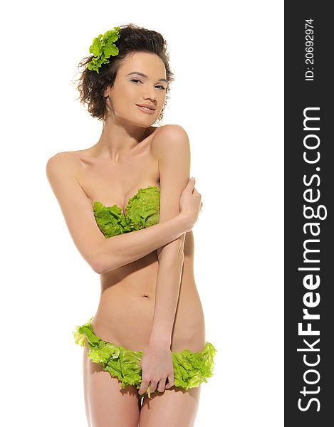 Sexy woman with cabbage and green lettuce