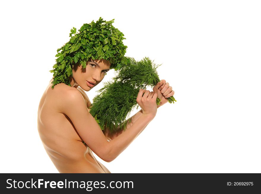 Beautiful woman with hat of parsley isolated on white