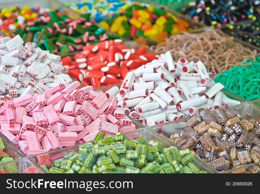 Assorted multicolored and multishaped candies in the market