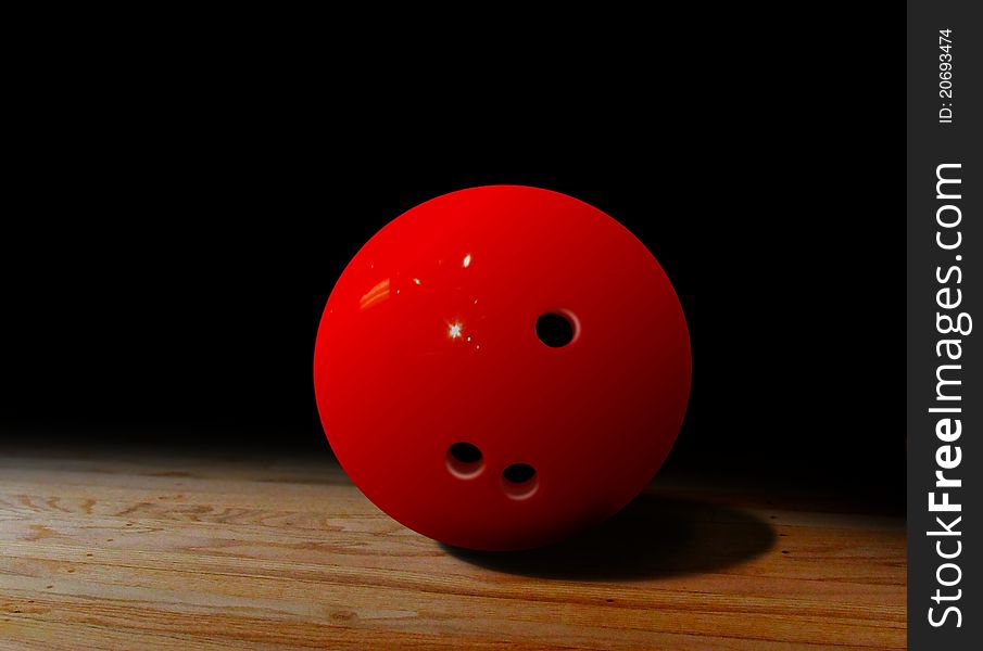 Bowling ball rolling on hard wood