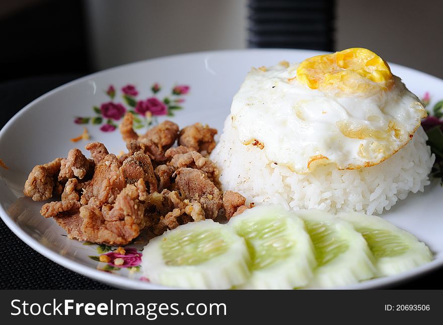 Fried Pork With Garlic Pepper And Fried Egg