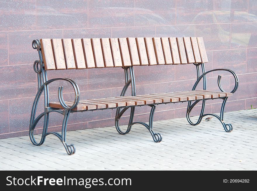 Bench to rest on the sidewalk