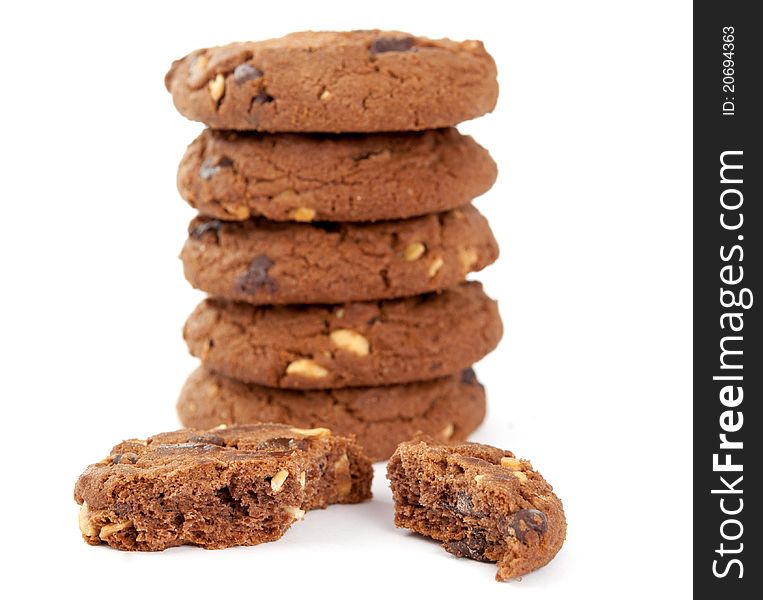 Cookies with nuts and chocolate on a white background