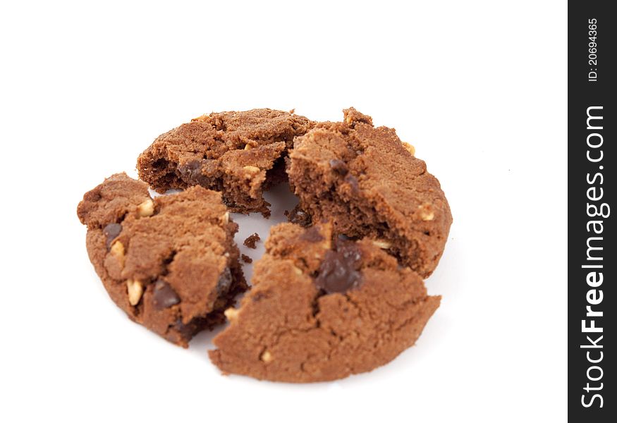 Cookies with nuts and chocolate on a white background