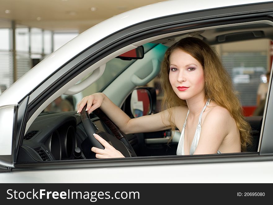 Beautiful young woman at the car. Beautiful young woman at the car