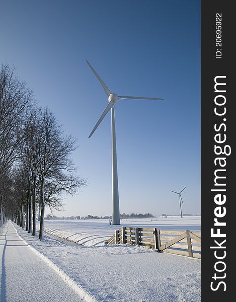 Wind turbines in winter landscape