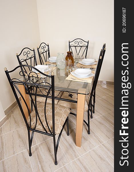 Large dining table and chairs in a house