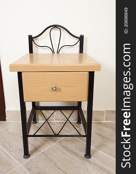 Small wooden table for interior design with shelf and drawer. Small wooden table for interior design with shelf and drawer