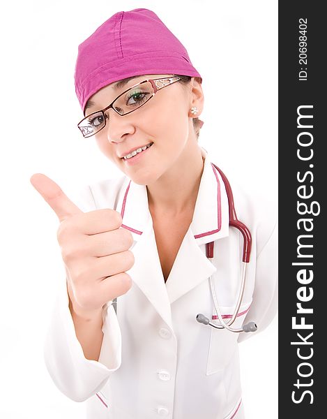 Portrait of young female doctor with thumb up on white background, closeup