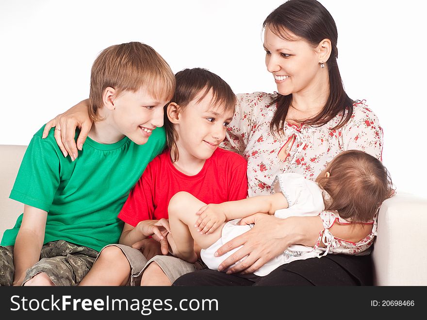 Portrait of a cute family at sofa