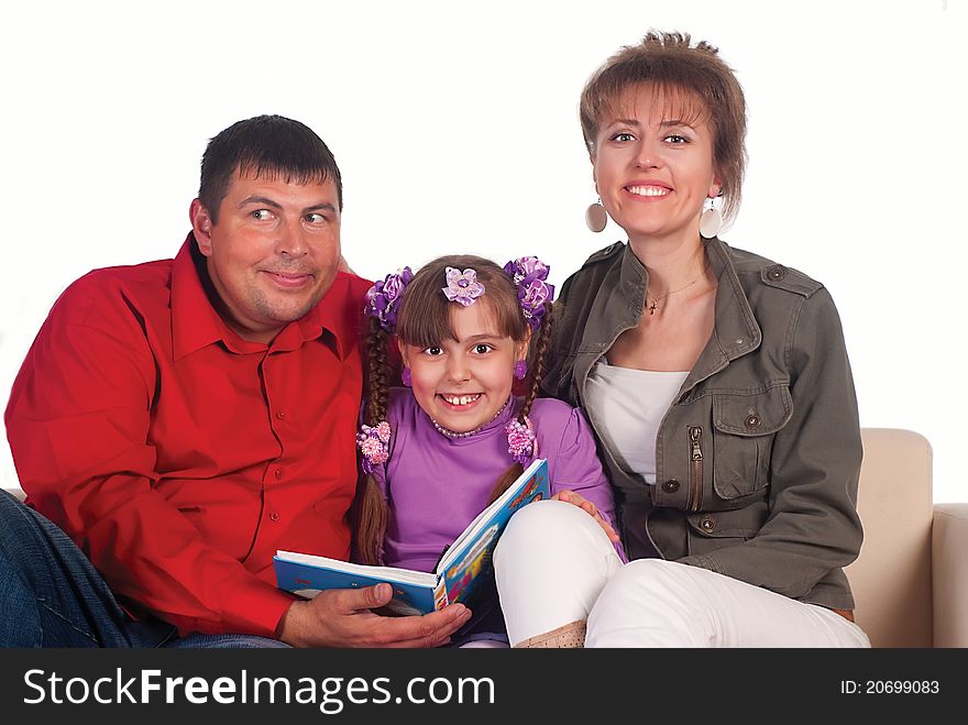 Daughter Reads With Parents