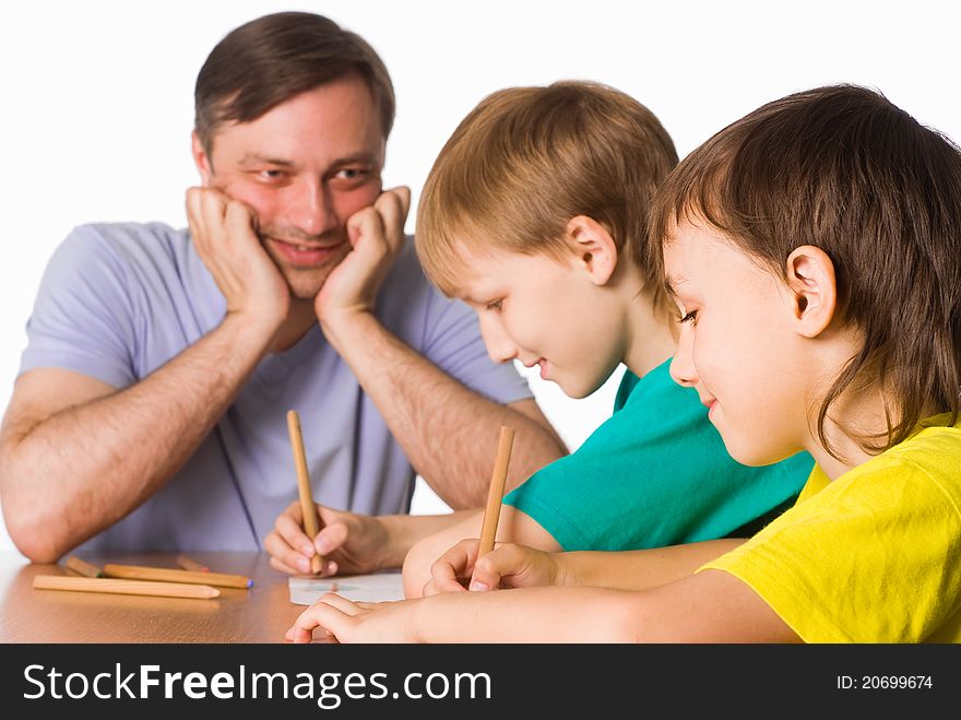 Portrait of a dad drawing with sons. Portrait of a dad drawing with sons