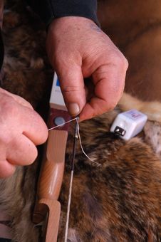 Archer Repairing Bow String Royalty Free Stock Image Archer Repairing Bow String Royalty Free Stock Image