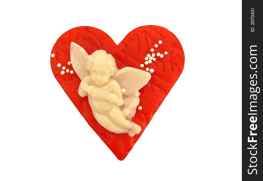 Sweet heart with angel made of marzipan