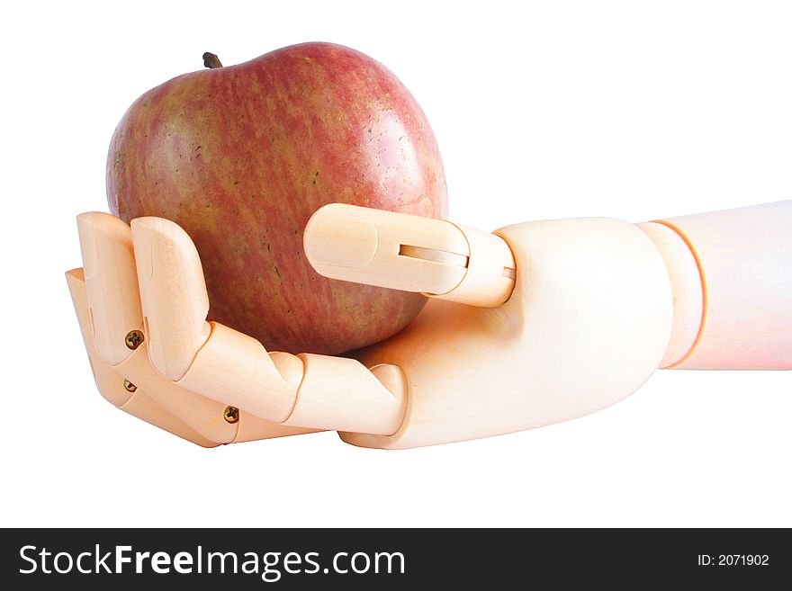 Wooden hand holding an apple