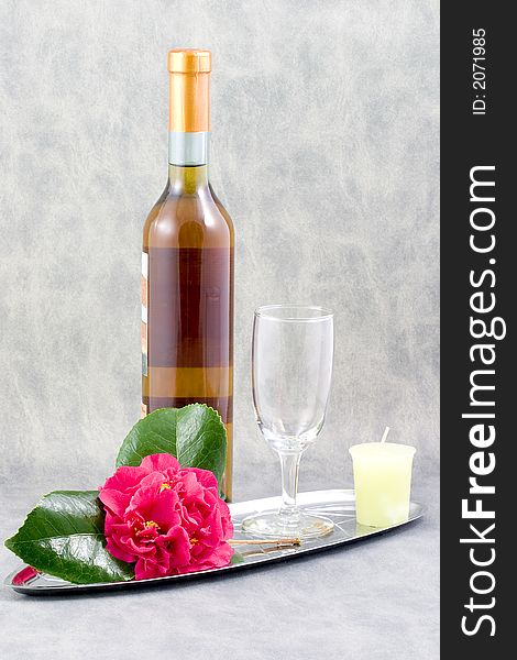 Her favorite wine, a beautiful camellia from the garden, add a candle and wine glass, she is all set. Her favorite wine, a beautiful camellia from the garden, add a candle and wine glass, she is all set.