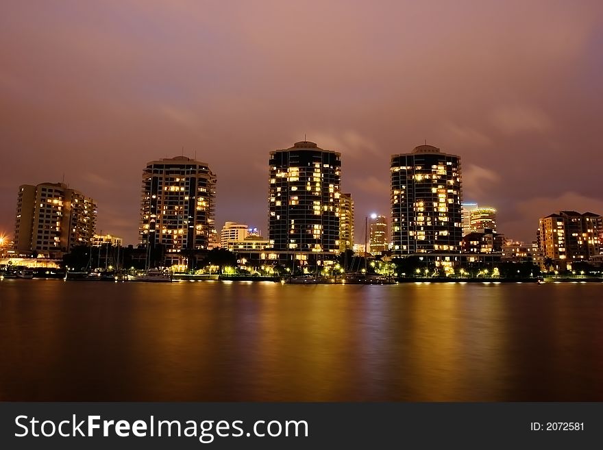 Modern river front buildings in the evening. Modern river front buildings in the evening