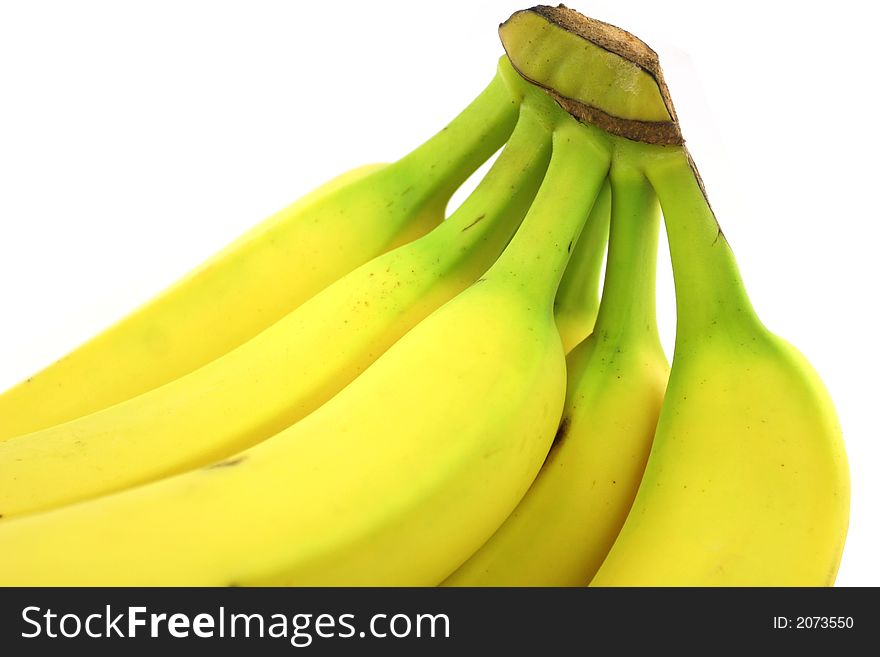 Fresh bunch of bananas over white background.