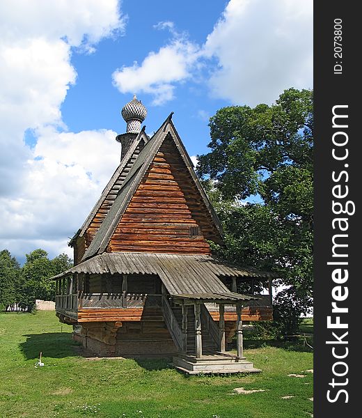 Summer view of the wooden churche without cross in Suzdal. (Suzdal, Vladimir region. Golden Ring of Russia). Summer view of the wooden churche without cross in Suzdal. (Suzdal, Vladimir region. Golden Ring of Russia)