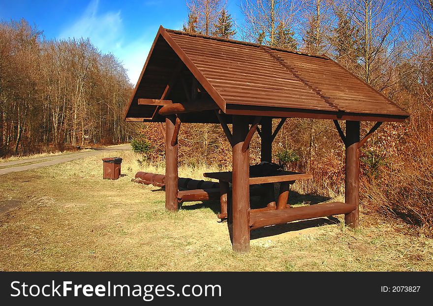 Brown gazebo in the forest