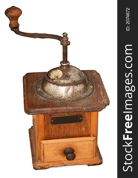 Old mechanical coffee grinder from a tree on a white background. Old mechanical coffee grinder from a tree on a white background.