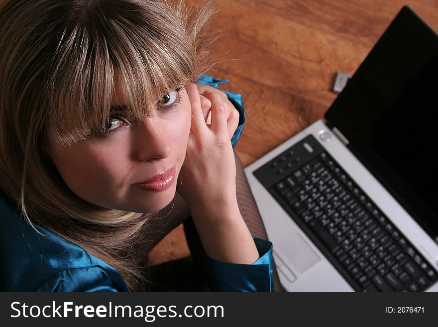 Business Woman With Laptop Sitting On The Floor