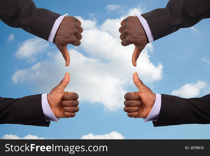 This is an image some hands competing against each other with a sky in the background.This image can be used to represent the theme Team Decisions