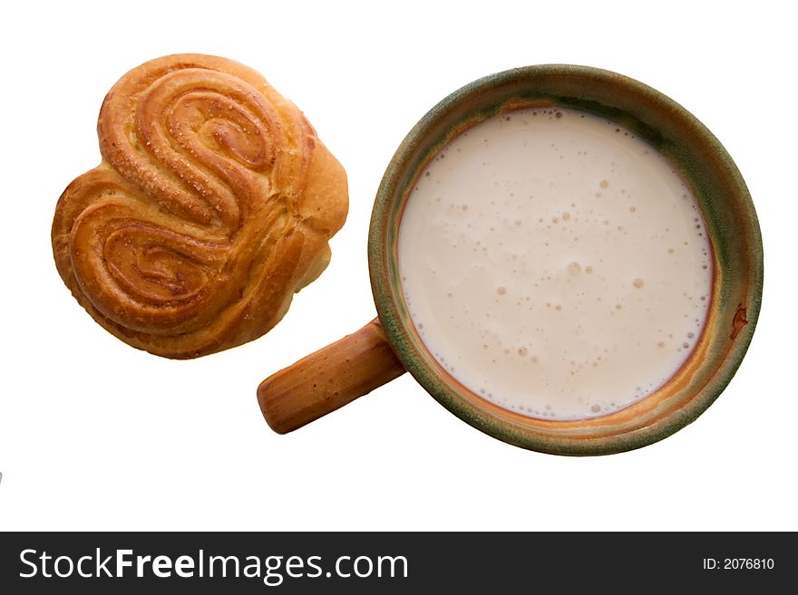 Top shot of cup of sour milk with sweet bun. Top shot of cup of sour milk with sweet bun