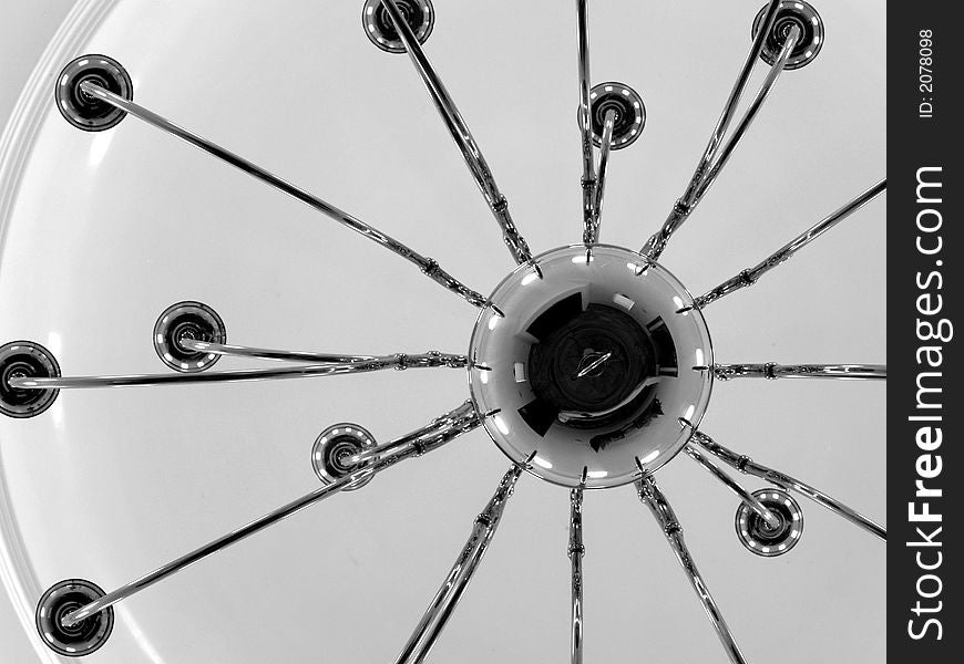 Abstract view looking up at a chandelier